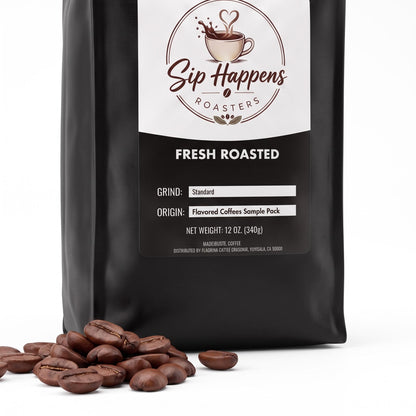 Black bag of Sip Happens Roasters Fresh Roasted coffee beans with several whole coffee beans scattered in front on a white background.